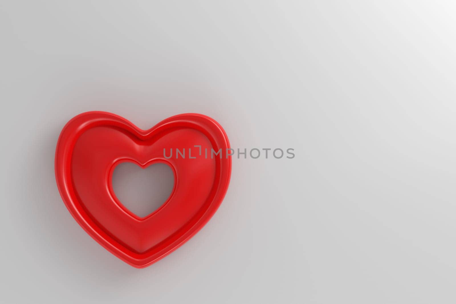 Red heart on white wall