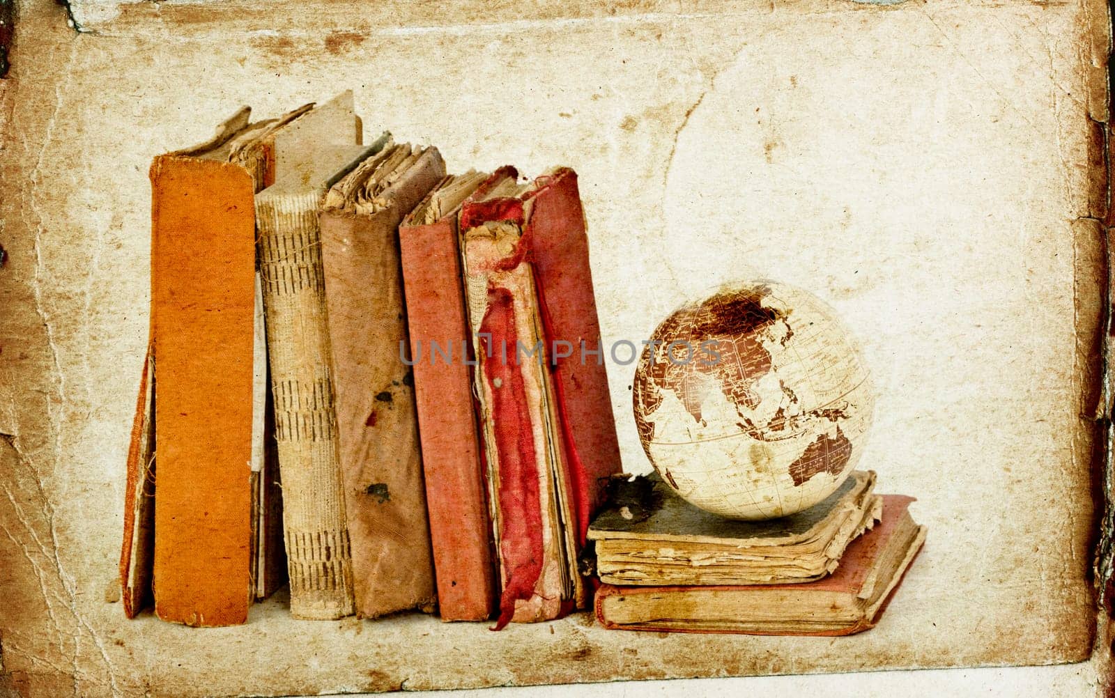 Vintage photo old books and Earth globe