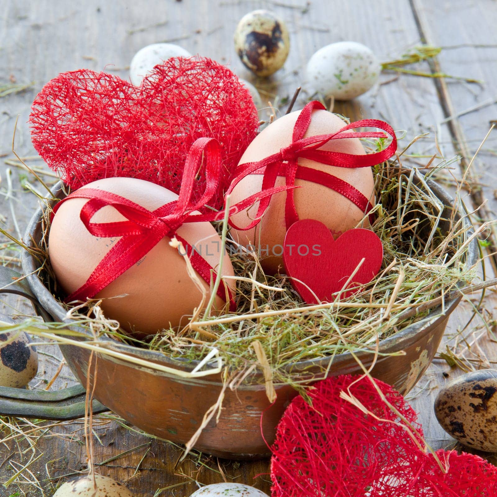 Various raw eggs in Easter basket