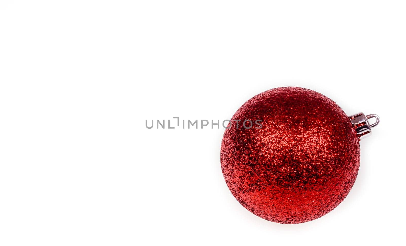 Red christmas glass bauble isolated on white