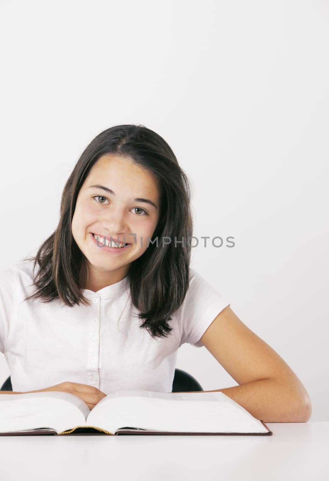 Young girl with book, copy space