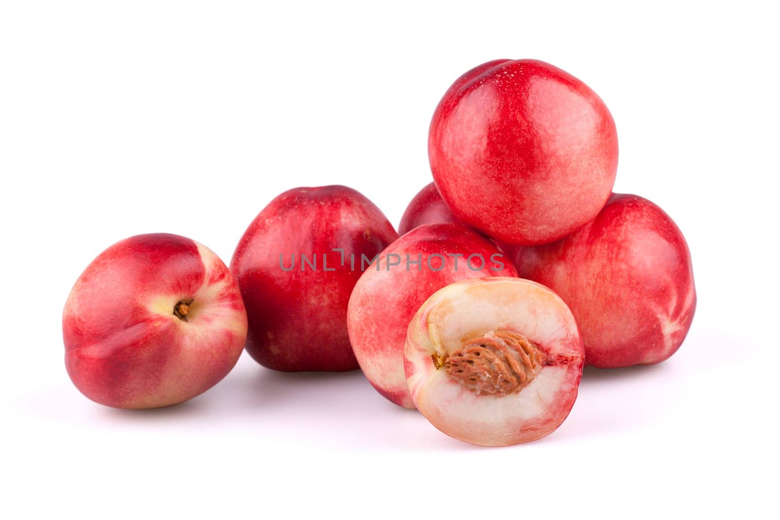 Nectarine peaches isolated on white background.