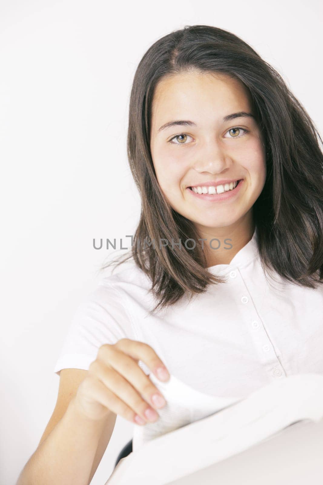 Smiling girl turn the page