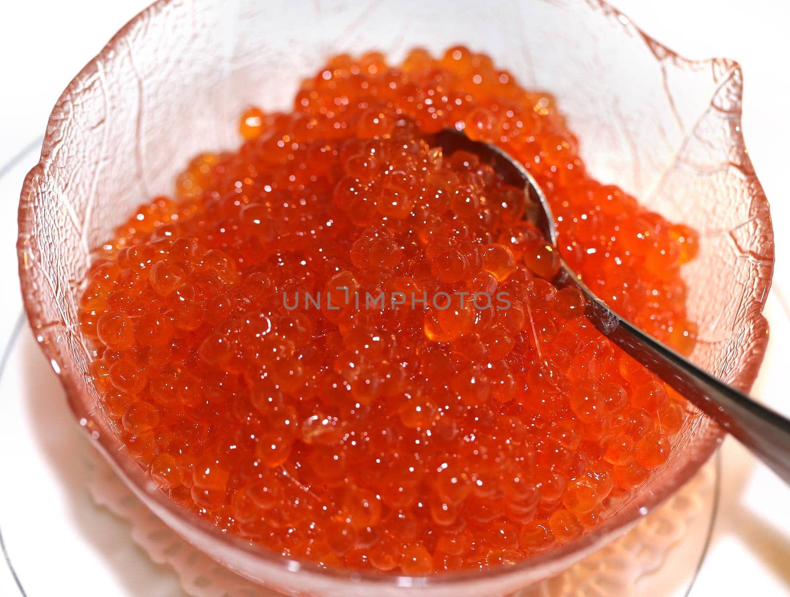 Large plate with red caviar
