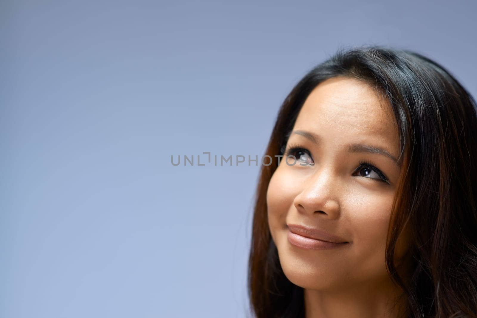 Young people, female teenager, woman, beauty and body care, portrait of happy Asian girl smiling in studio on gray background, copy space