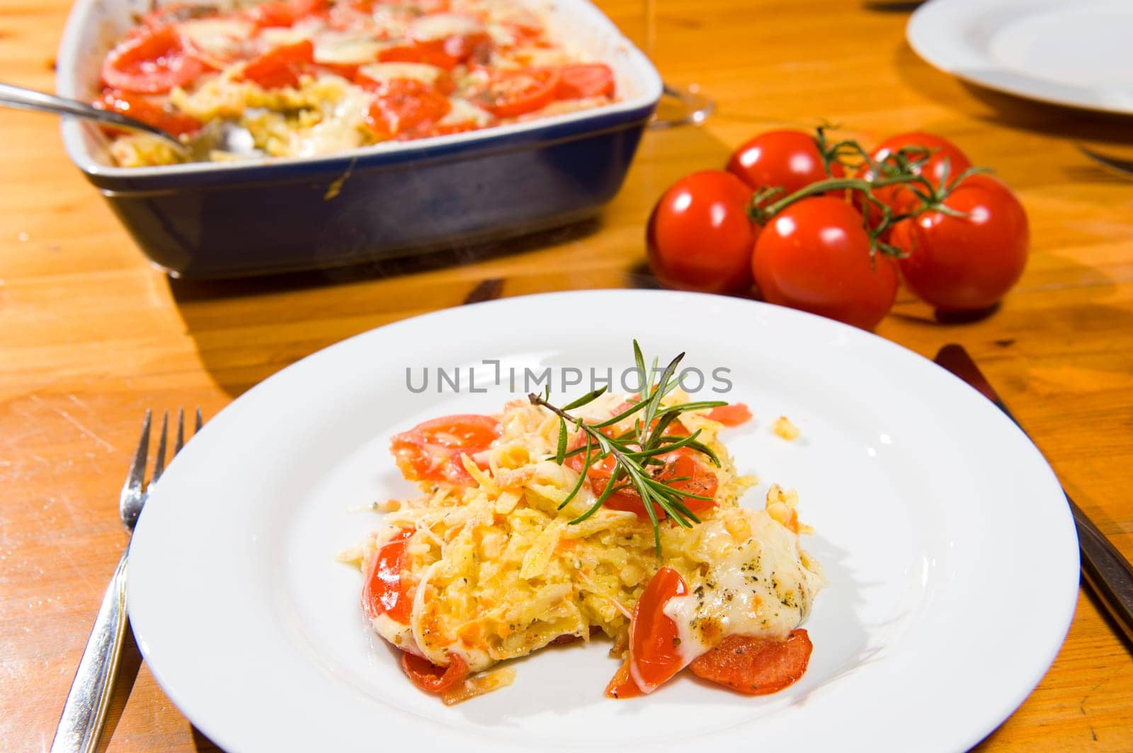Casserole with tomatoes and cheese