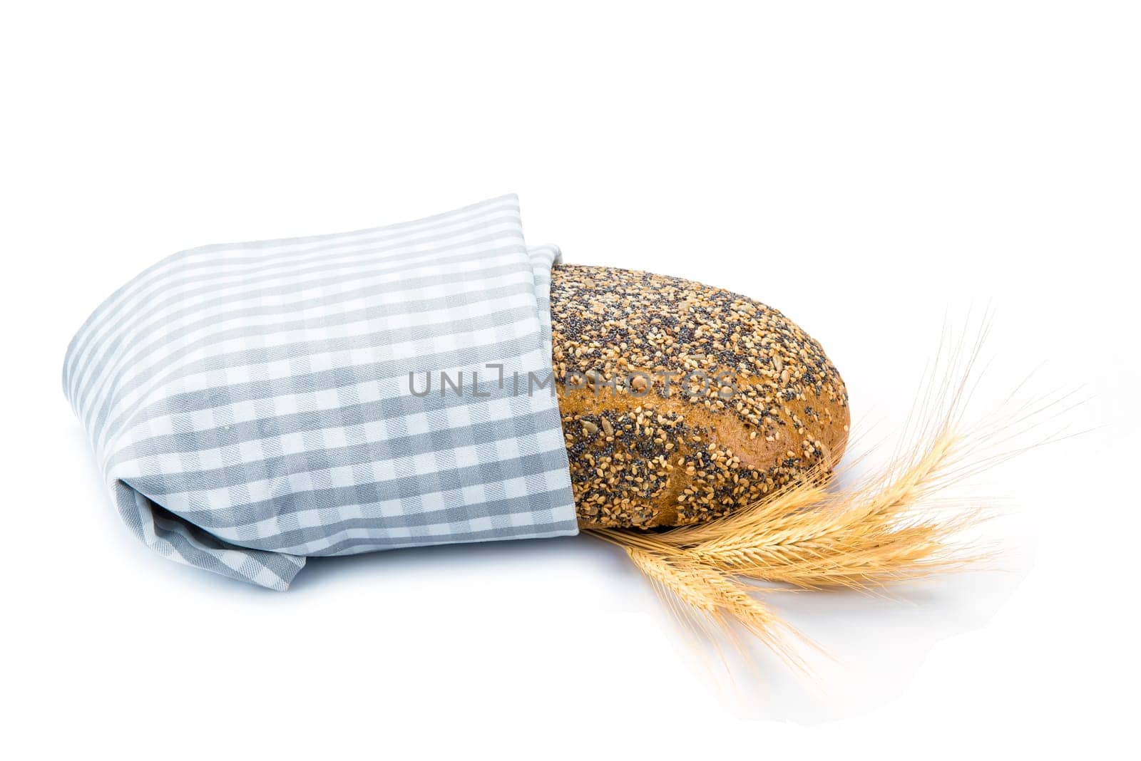 Multigrain black bread isolated on a white background