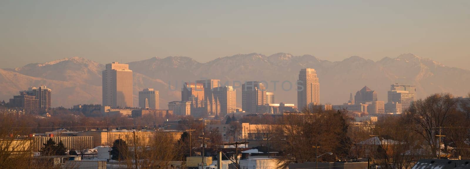 Salt Lake City with the Wasatch Mountain Range showing through the pollution