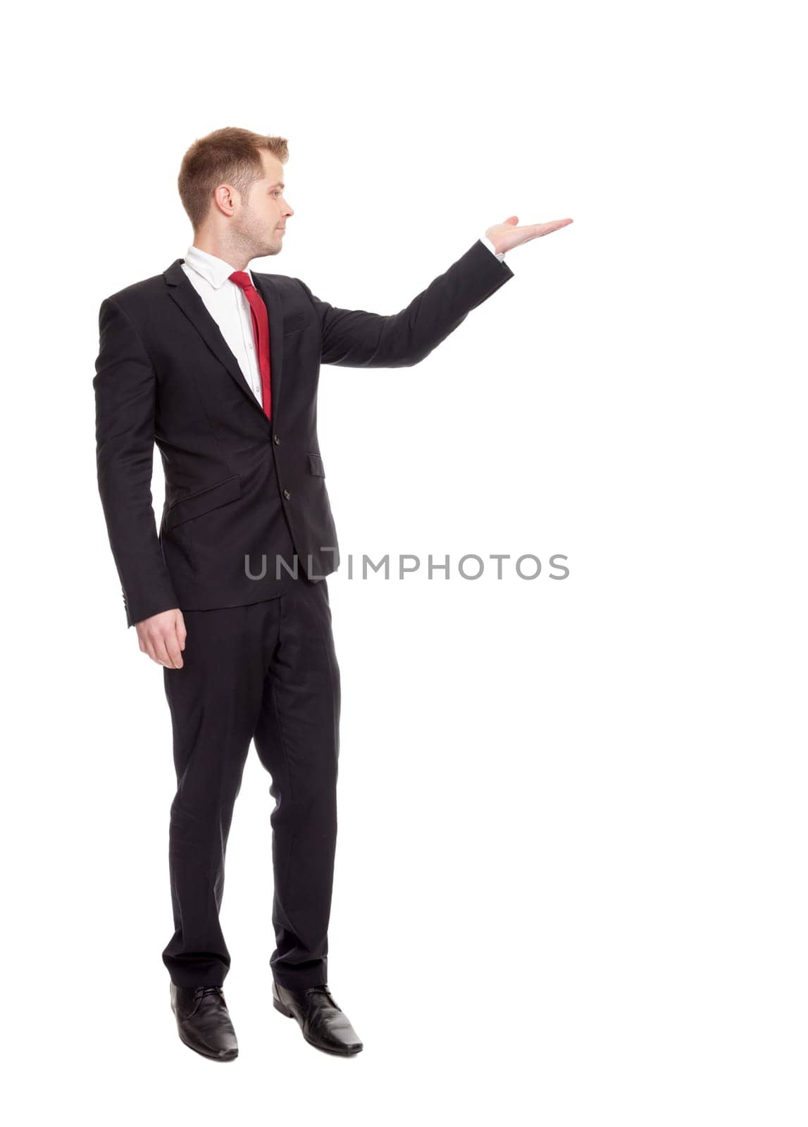Businessman presenting your ad, isolated on white