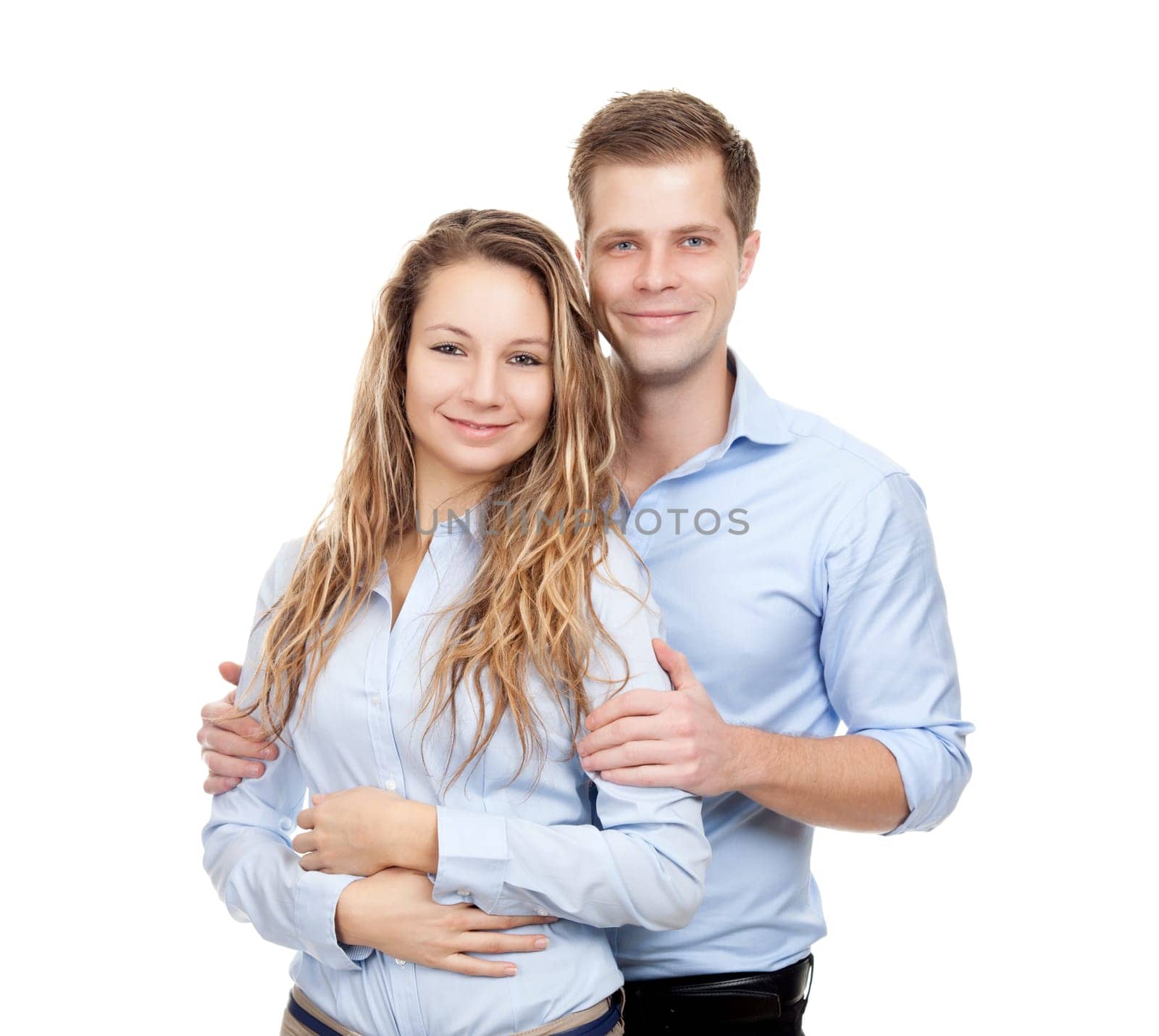 Young happy couple smiling, isolated on white