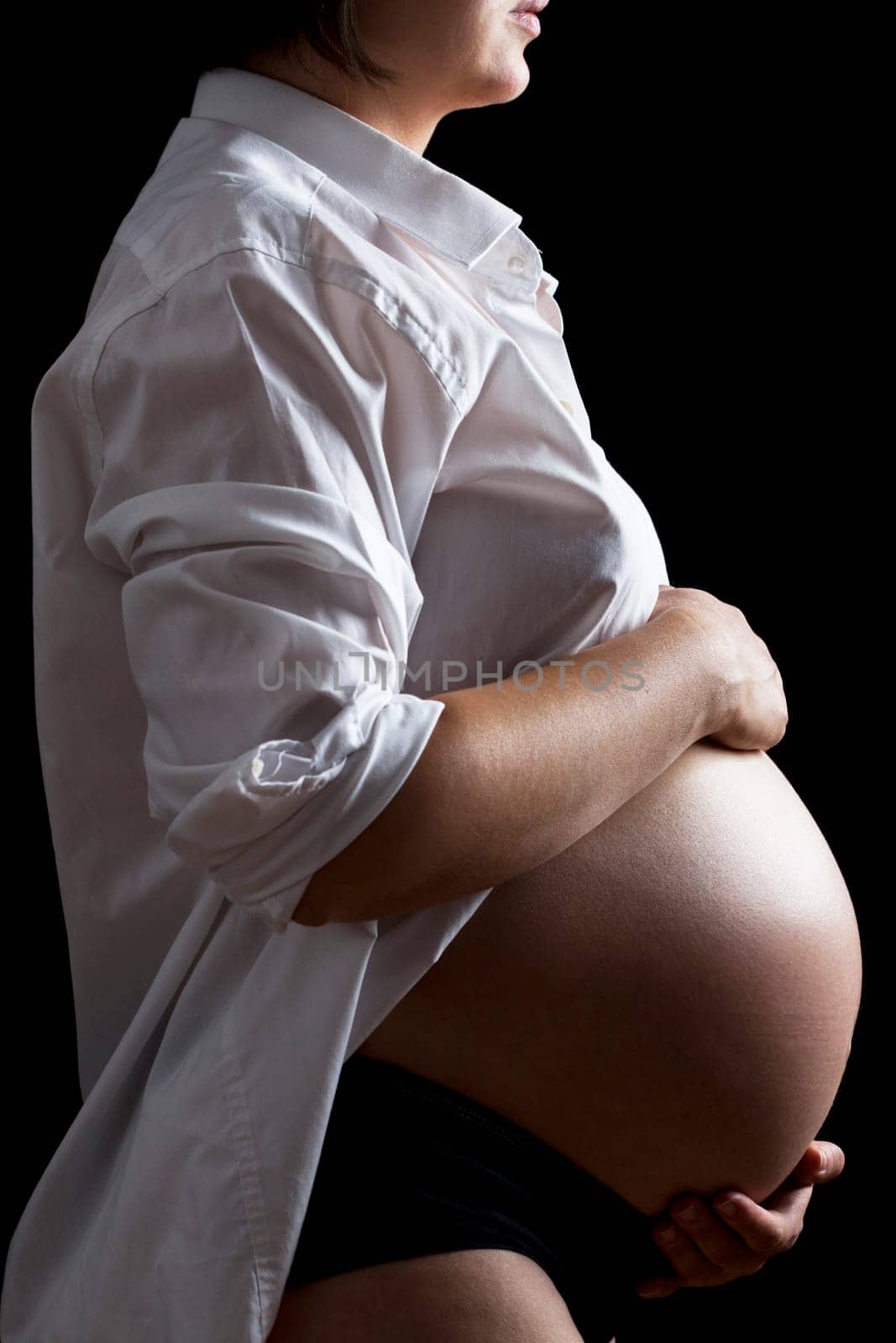 Belly of a nine month pregnant woman