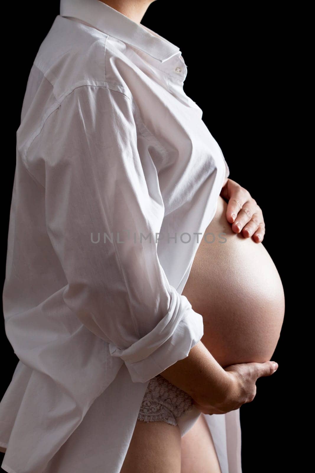 Belly of a nine month pregnant woman