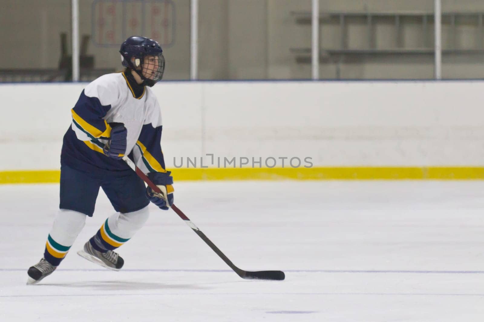 Female ice hockey player playing in a game