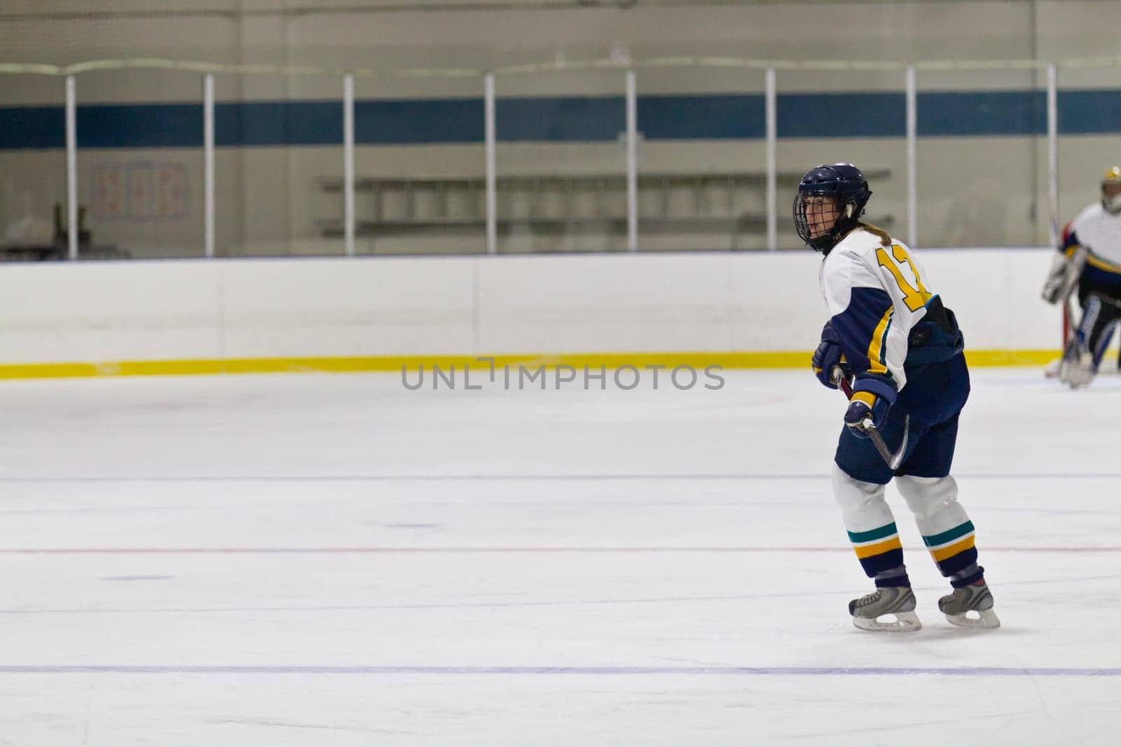Female ice hockey player playing in a game