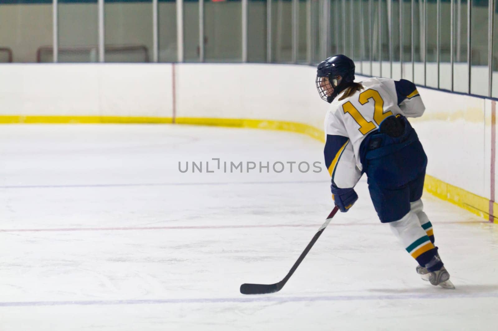 Female ice hockey player playing in a game