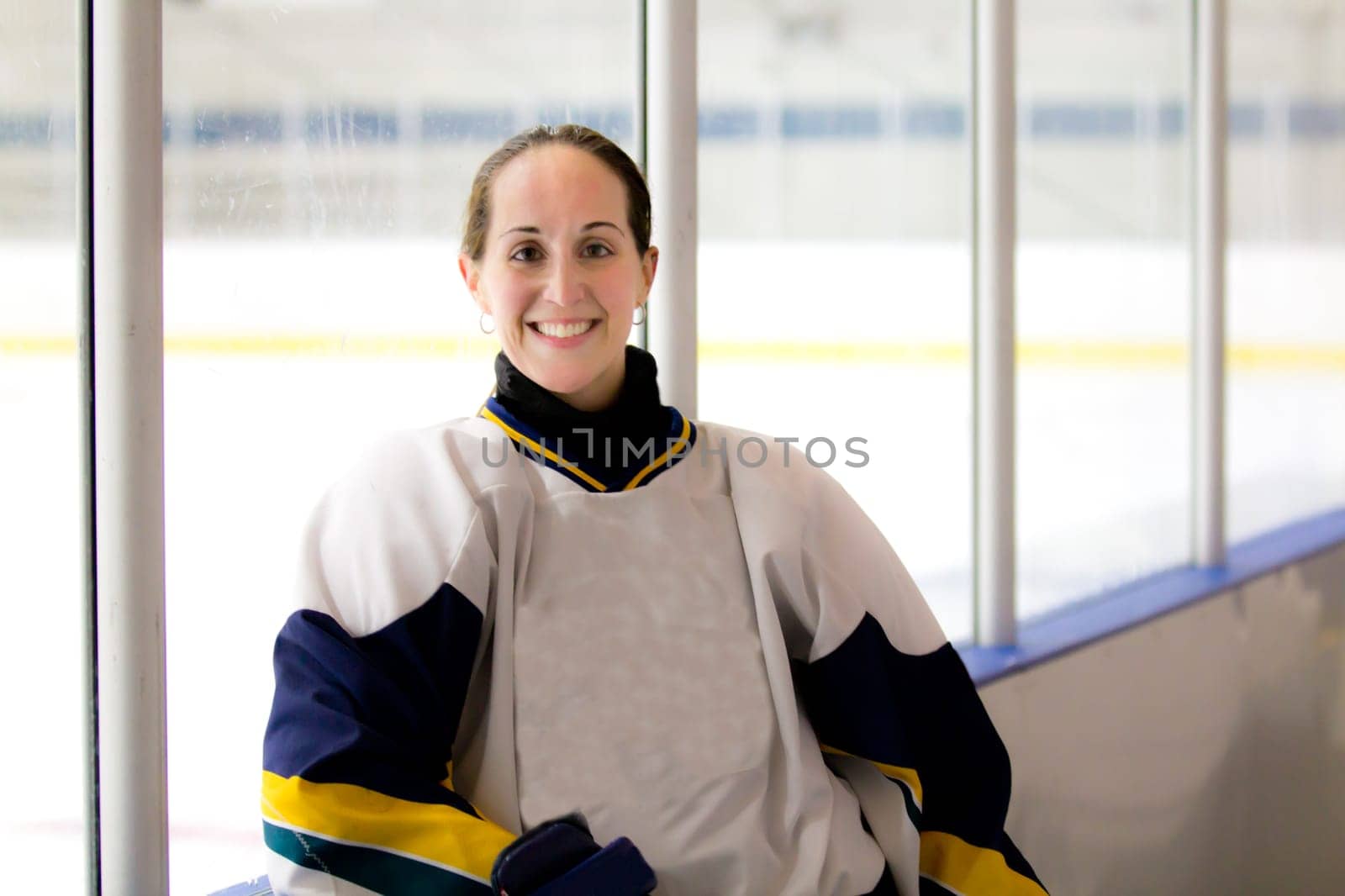 Female ice hockey player playing in a game
