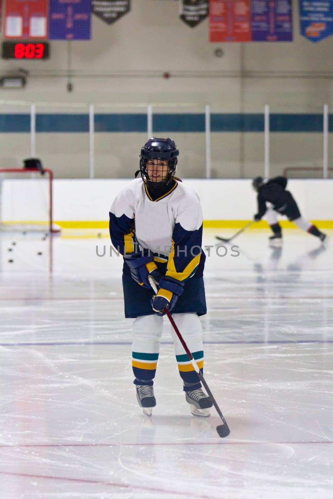 Female ice hockey player playing in a game