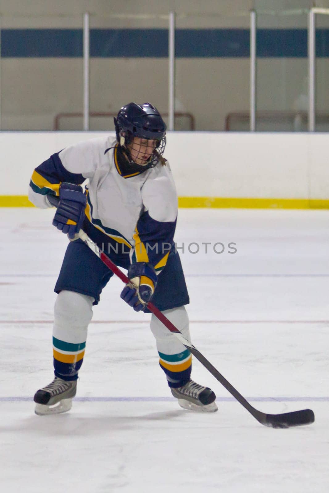 Female ice hockey player playing in a game