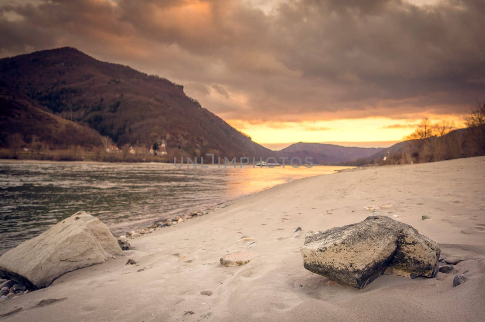 Sunset on the sandy beach along the Danube