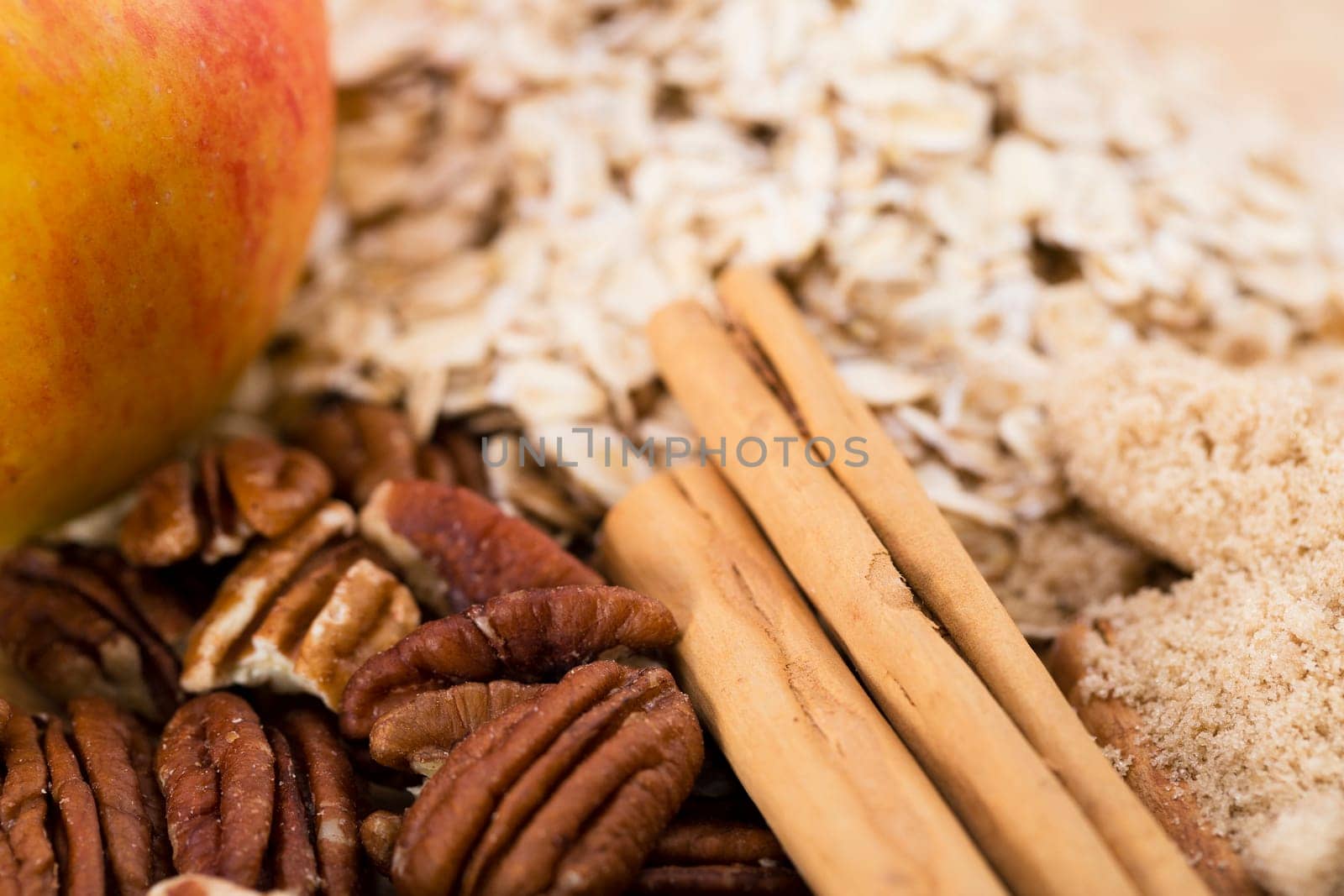 Baking ingredients, pecans and cinnamon sticks.