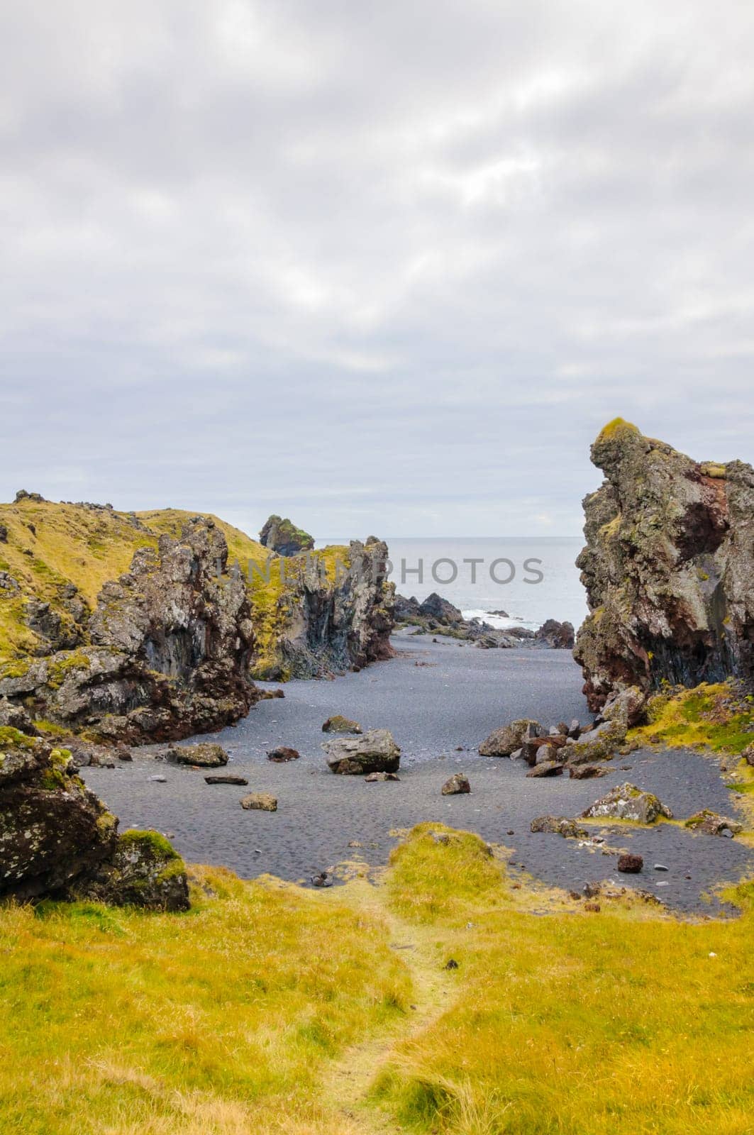 Icelandic beach with black lava rocks, Snaefellsnes peninsula, Iceland