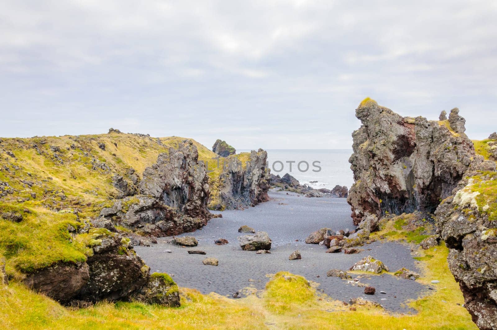 Icelandic beach with black lava rocks, Snaefellsnes peninsula, Iceland