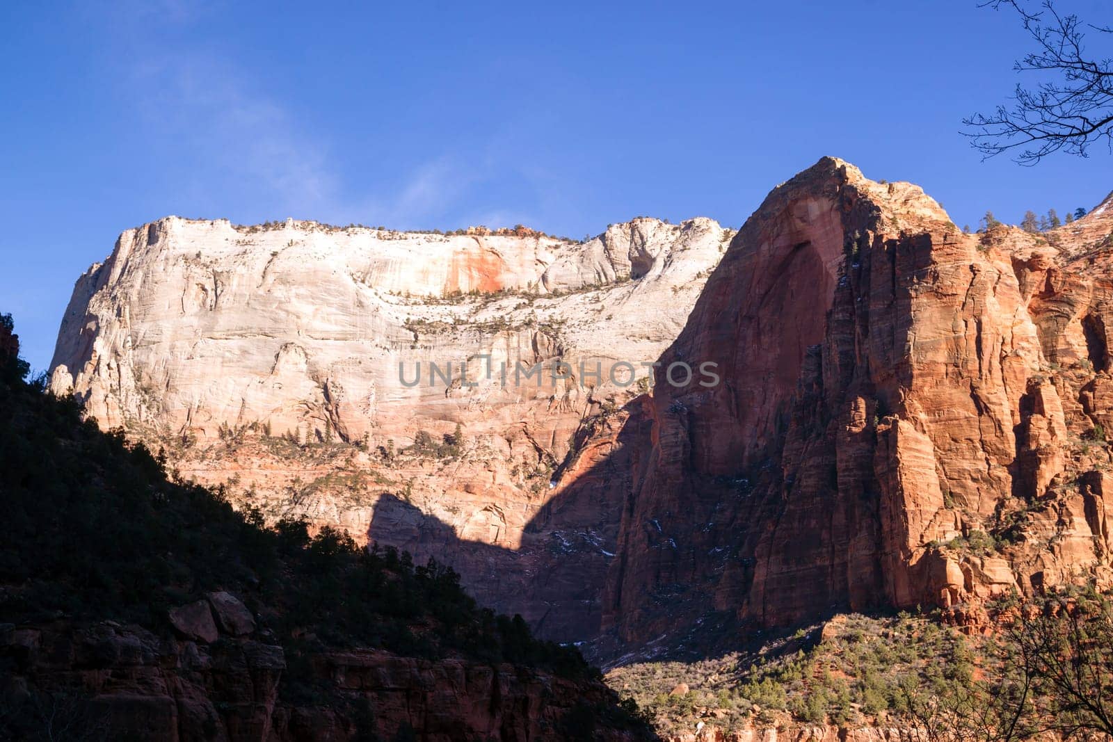 The light has not quite reached the valley int this horizontal composition of early morning in the desert Southwest