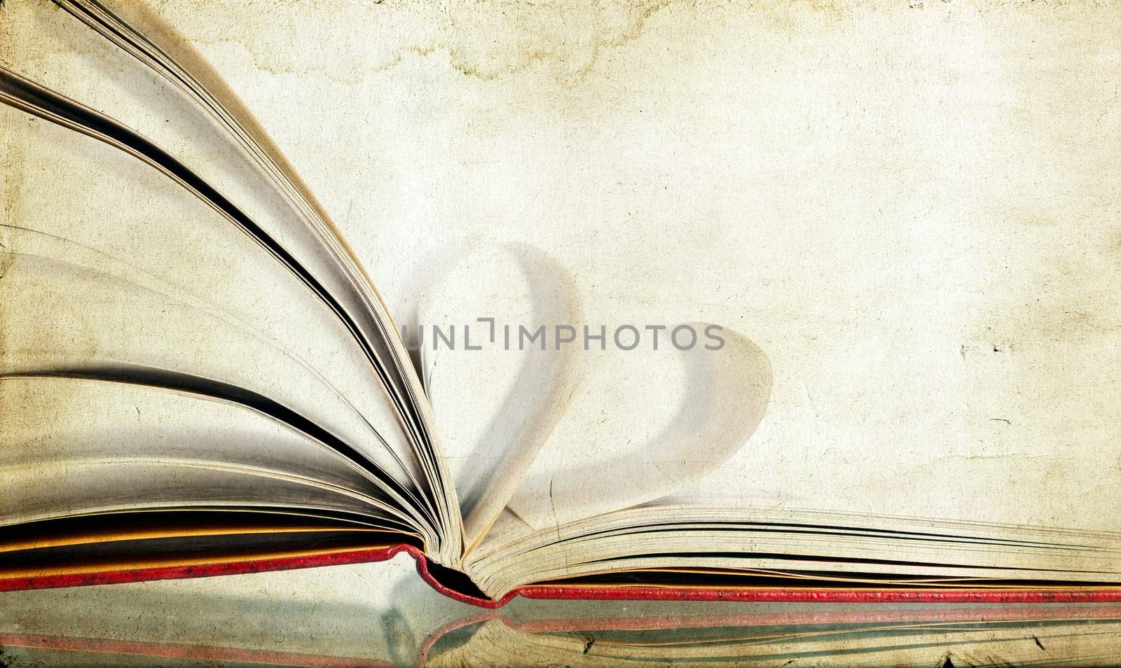 Vintage photo of heart shaped book pages