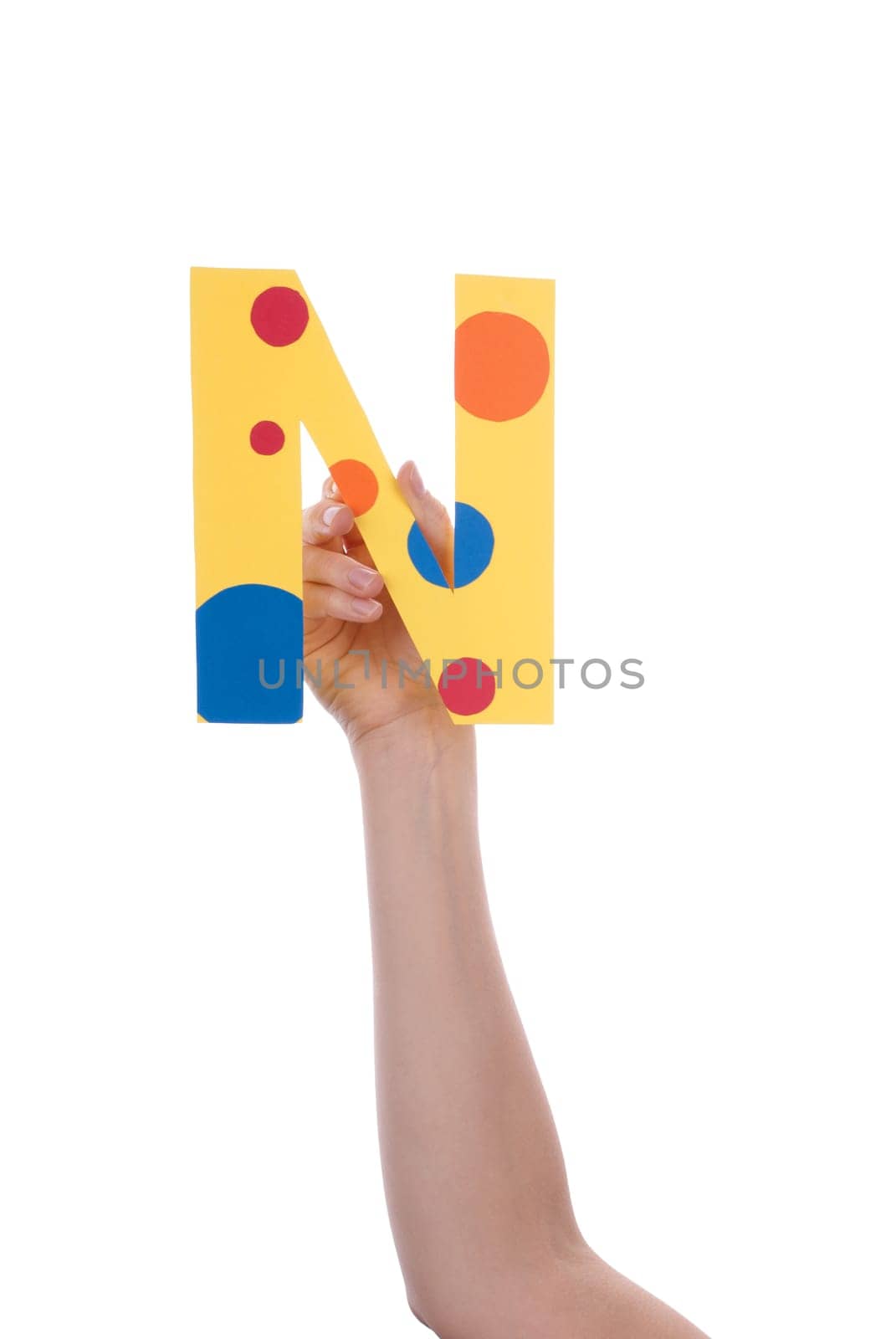 A Hand Holding a Colorful N, Isolated