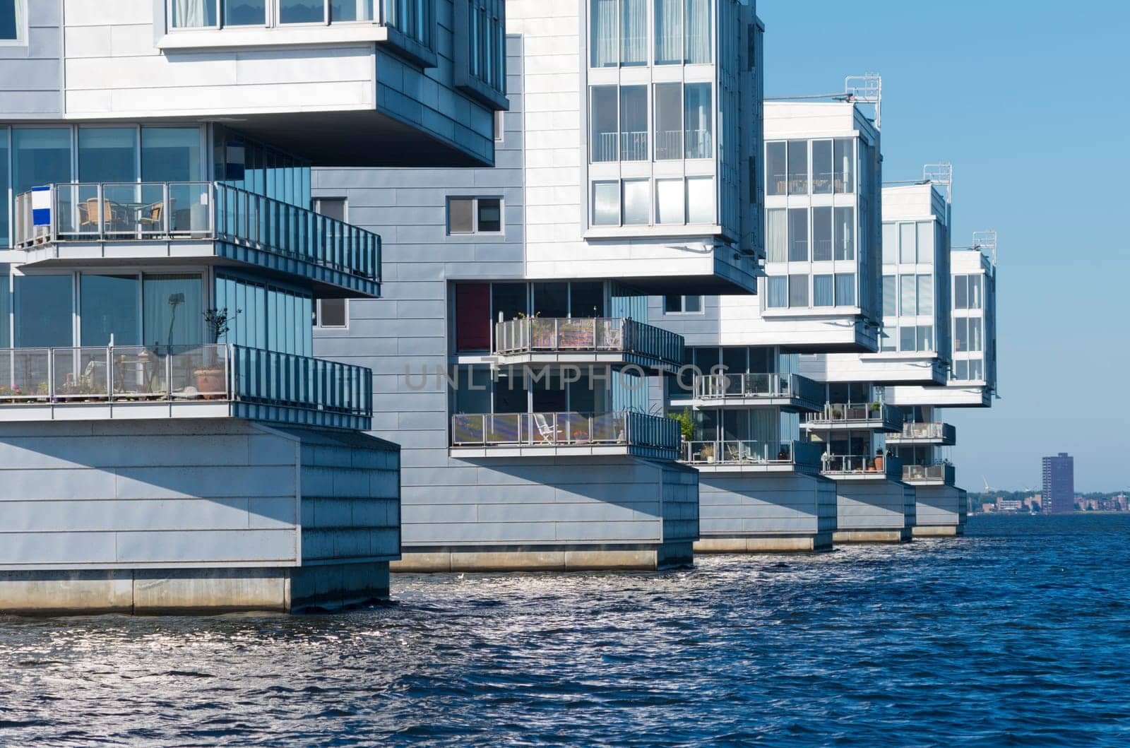 modern apartments at a lake shore in the netherlands