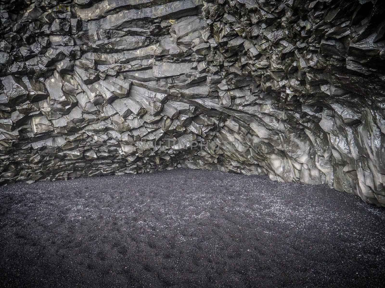 Photo of a stunning rock formation against the backdrop of Iceland's black floor by artofphoto