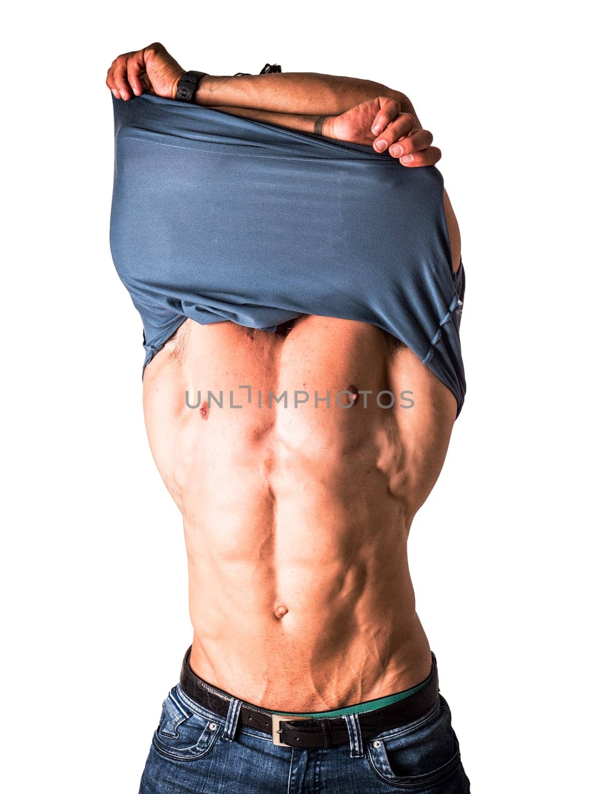 Photo of a muscular man showcasing strength and power by lifting a blue object over his head by artofphoto