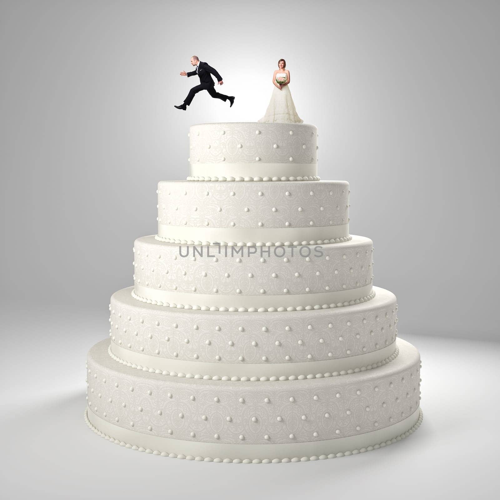 classic wedding cake with groom and bride