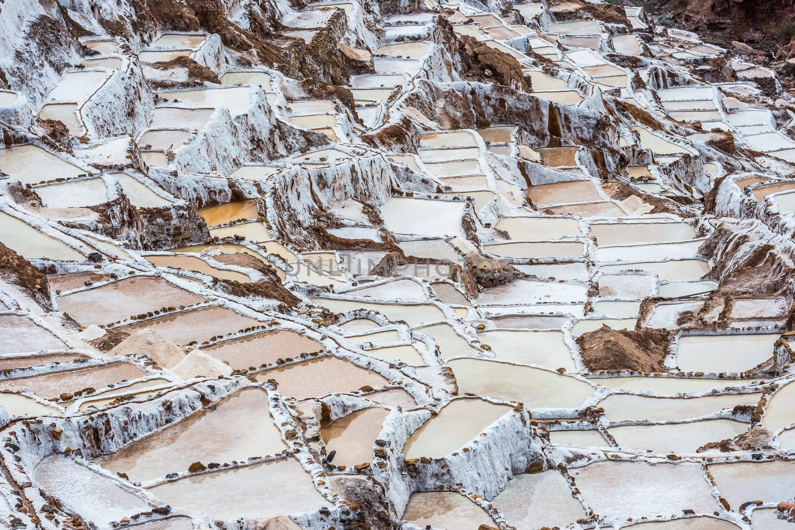 Maras salt mines in the peruvian Andes at Cuzco Peru