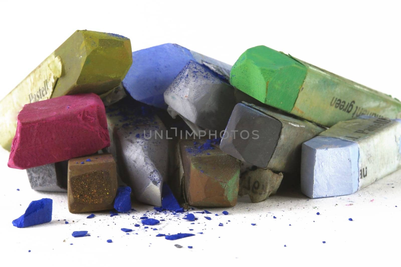Pastel chalk pieces in different colors,used in a heap