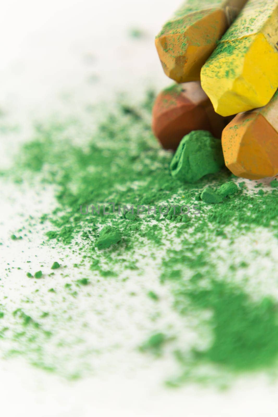 Pastel chalk pieces in different colors,used in a heap