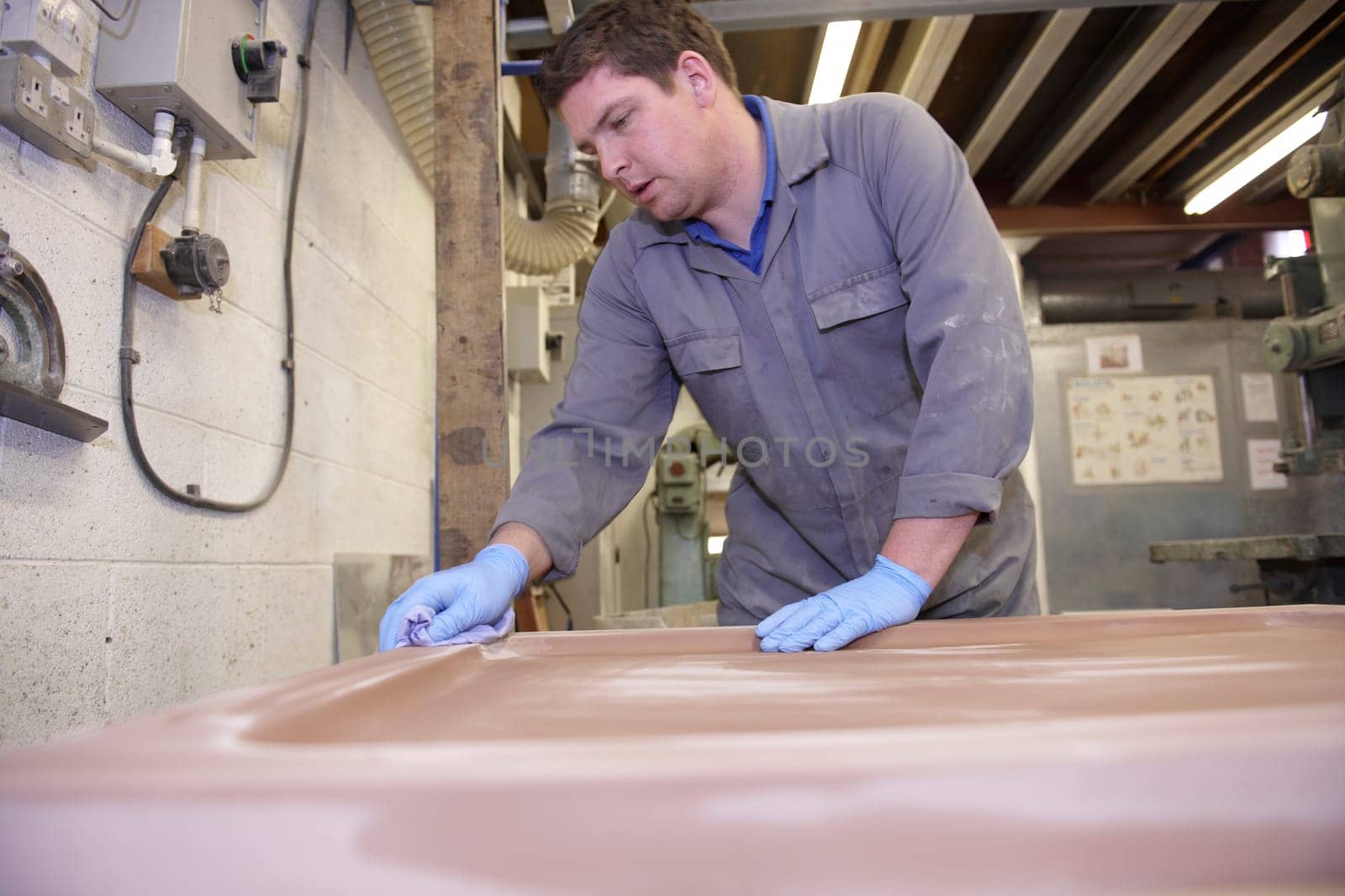 senior worker on factory floor in the manufacturing industry