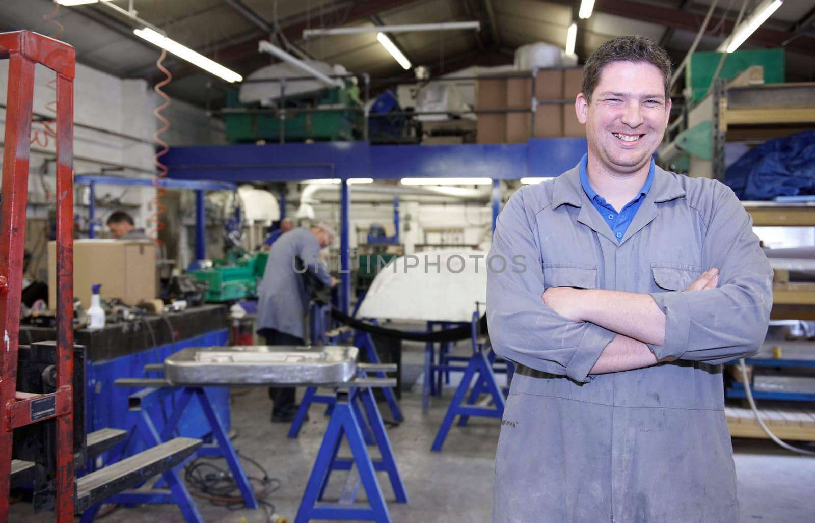 senior worker on factory floor in the manufacturing industry