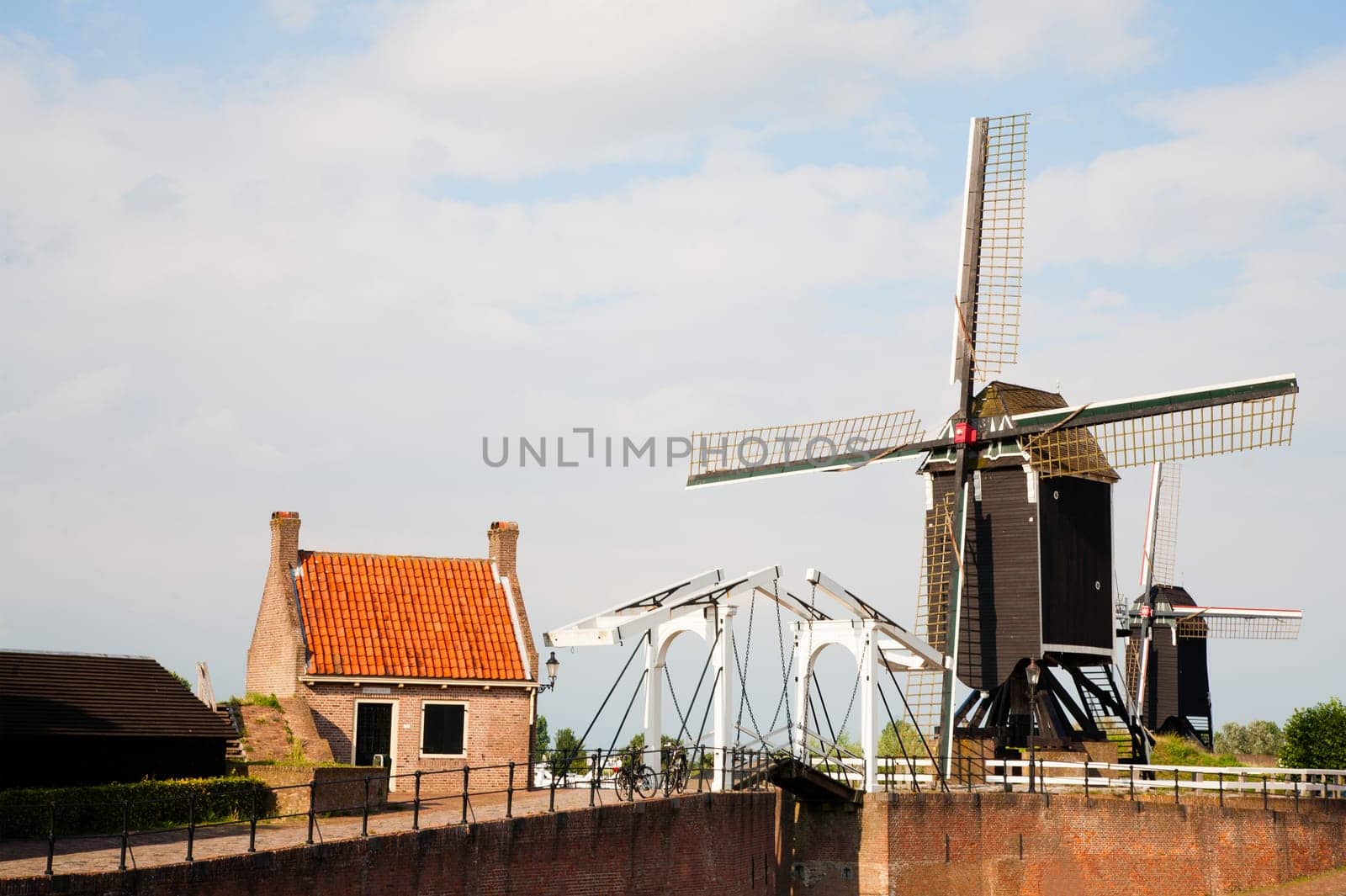 Windmill and drawbridge in Heusden  a fortified town in the Netherlands.