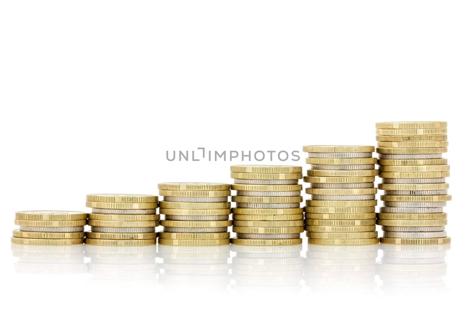 Rising silver and gold  coins stairs with reflection isolated on white background
