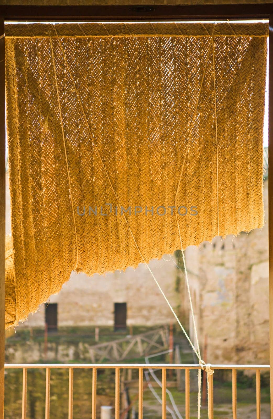 Blinds made from grass cord or esparto for windows. Andalusian traditional artwork, Cordoba, Spain