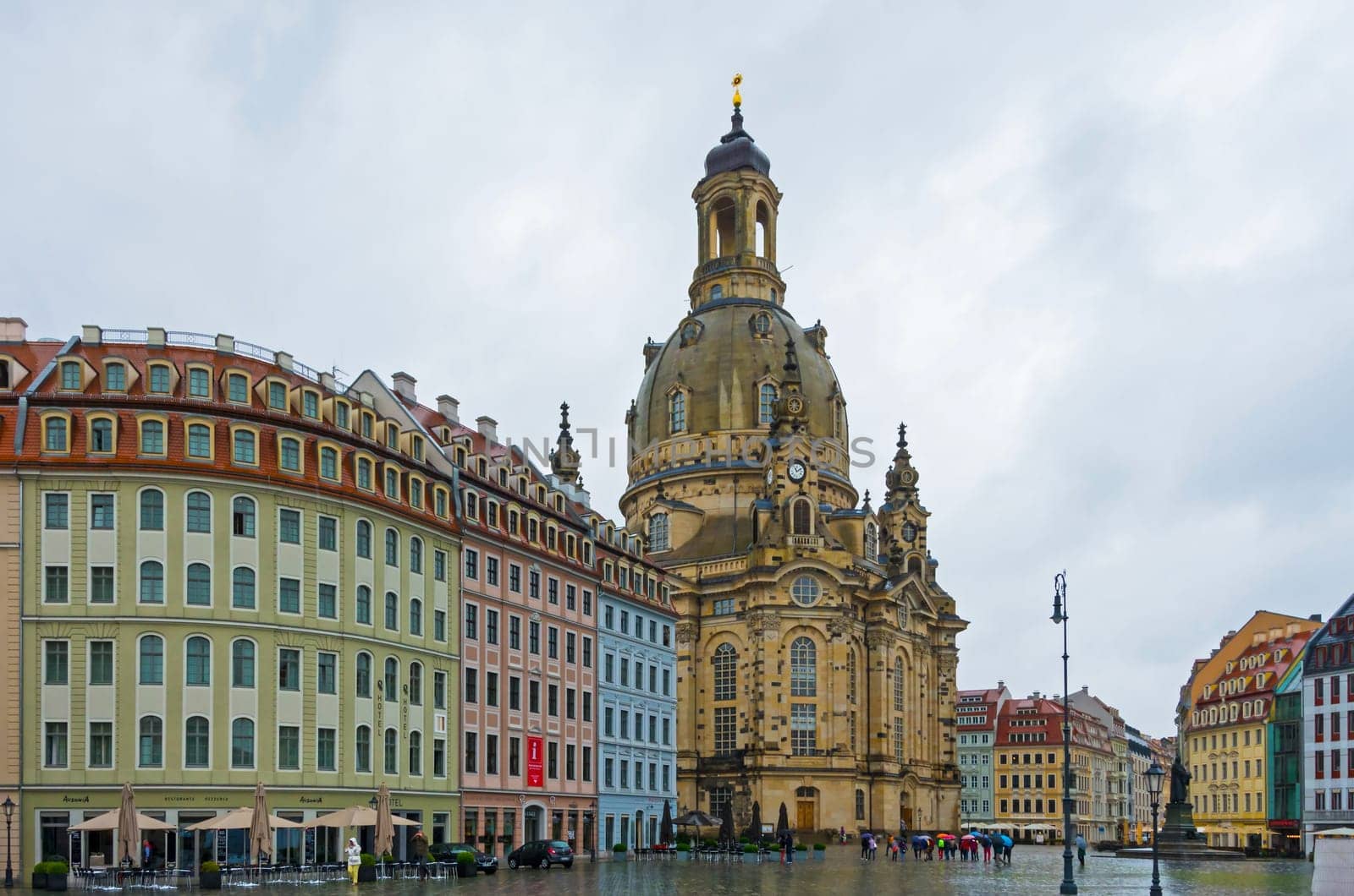 Dresden cathedral and colourful buildings in a rainy day.