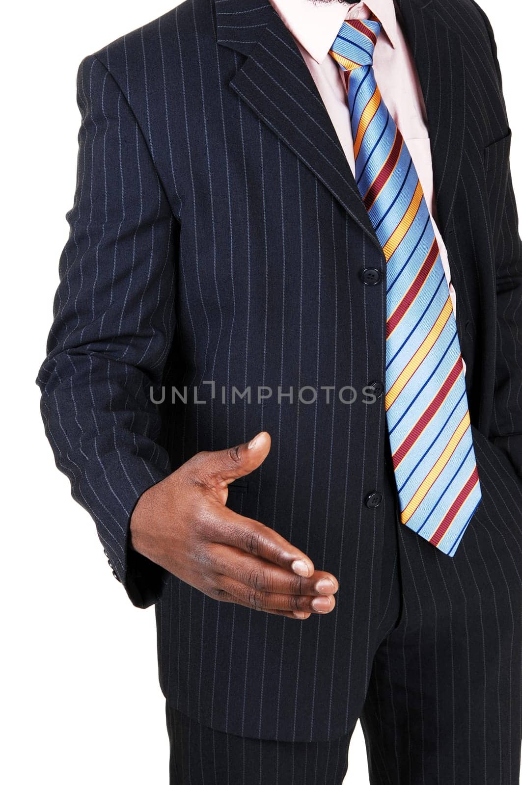A handsome young black man in a blue suit greeting with outstretched.hand, for white background..