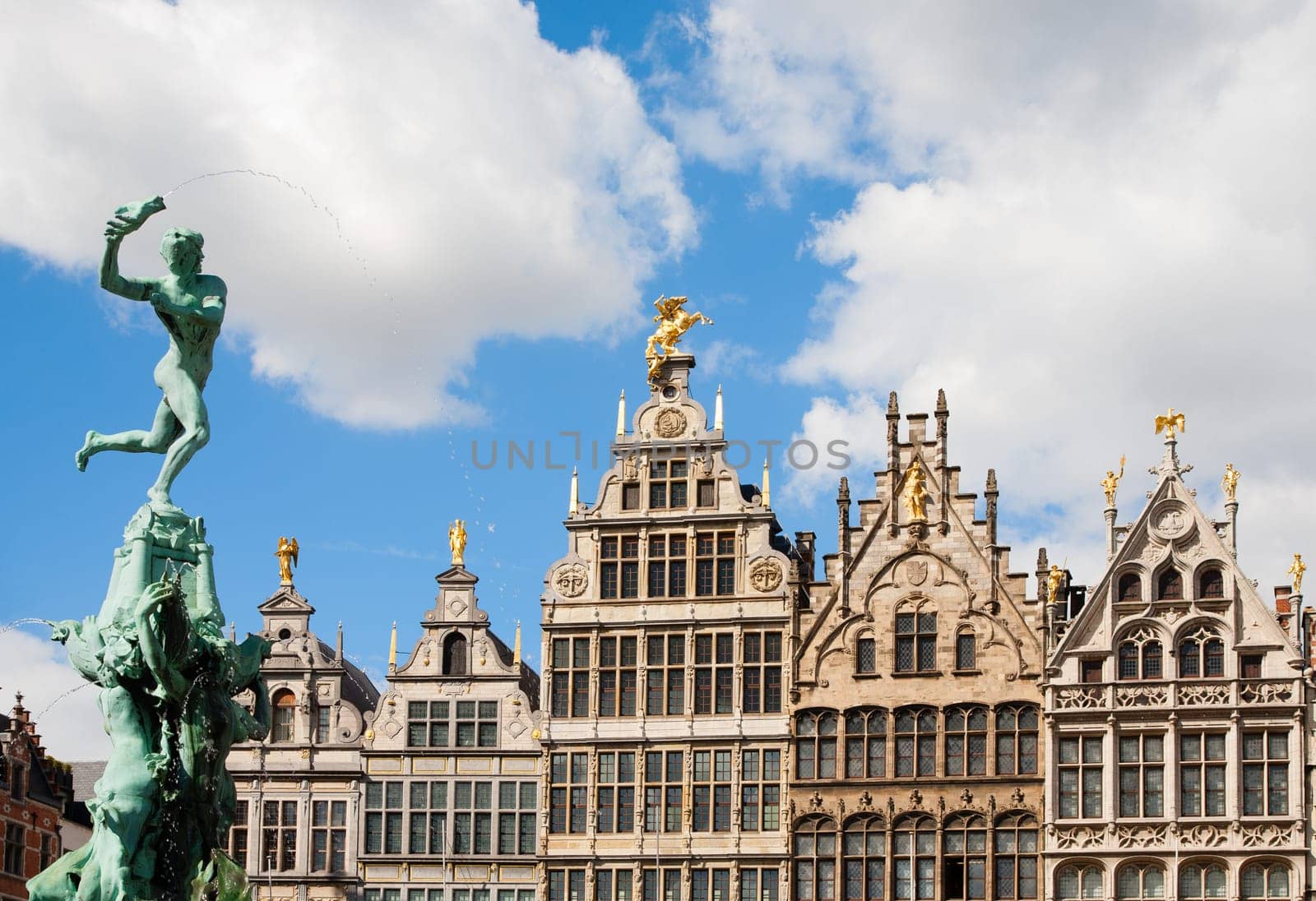 Guildhouses in Antwerp with the statue of Brabo and the giant's hand.