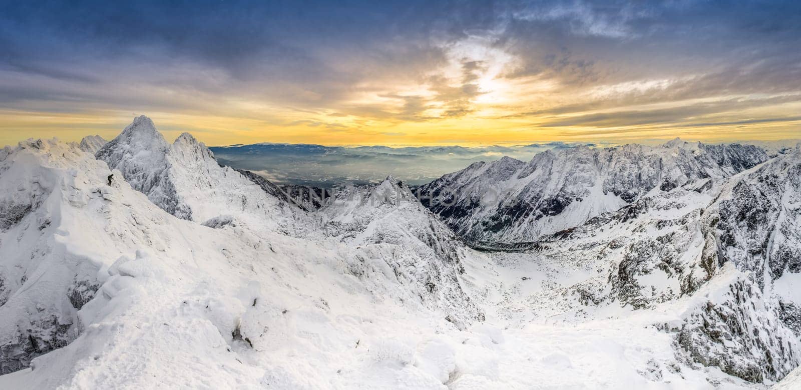 Panoramic view of winter mountains at sunset, High Tatras, Slovakia