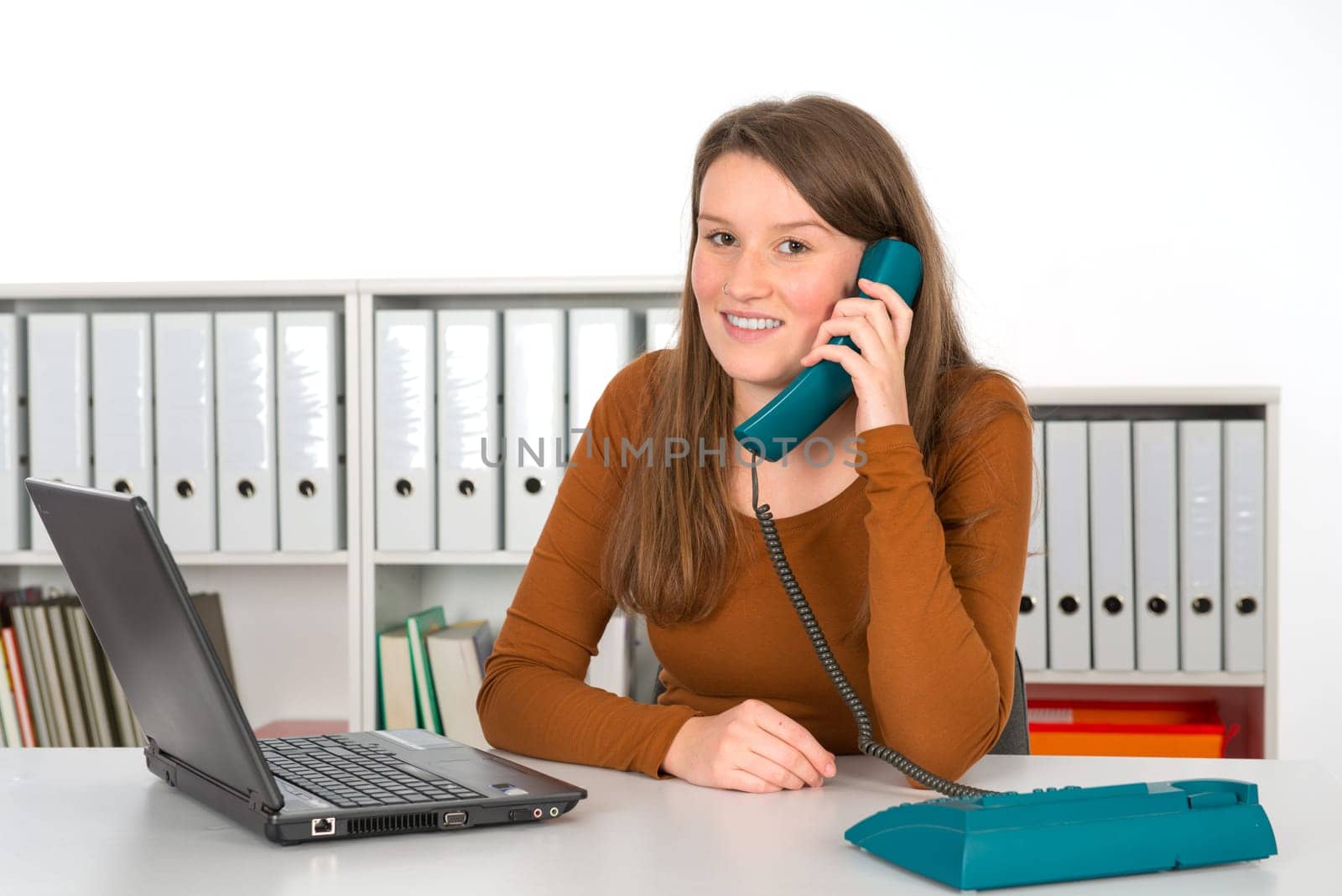 Young businesswoman talking on the phone