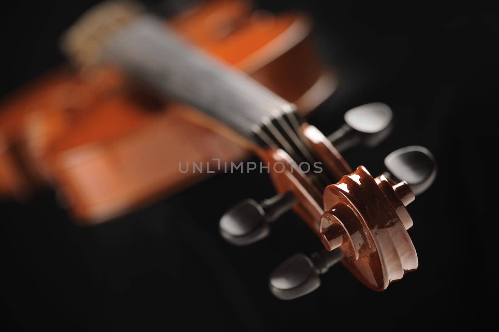 close up shot of a violin, shallow deep of field