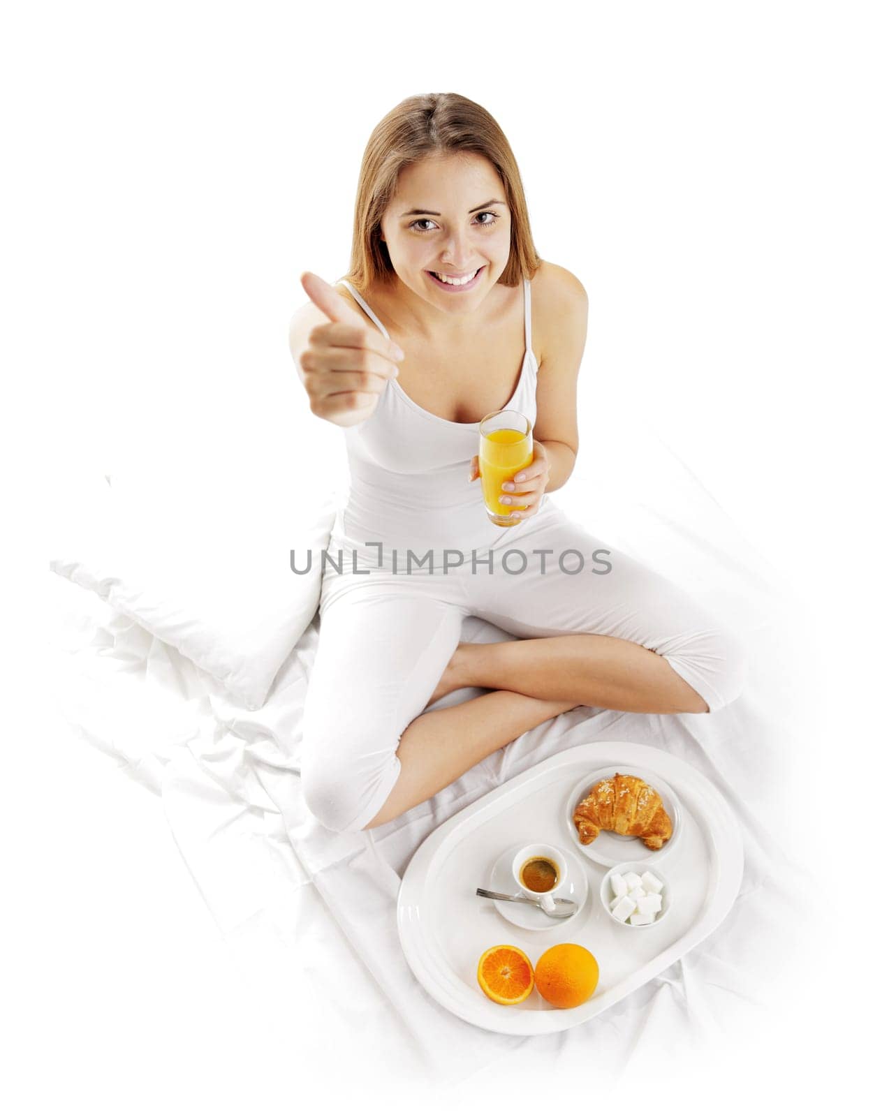 Woman waking up to breakfast in bed