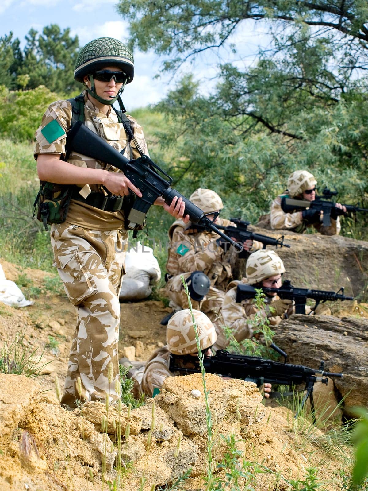 British soldiers in desert uniform in action