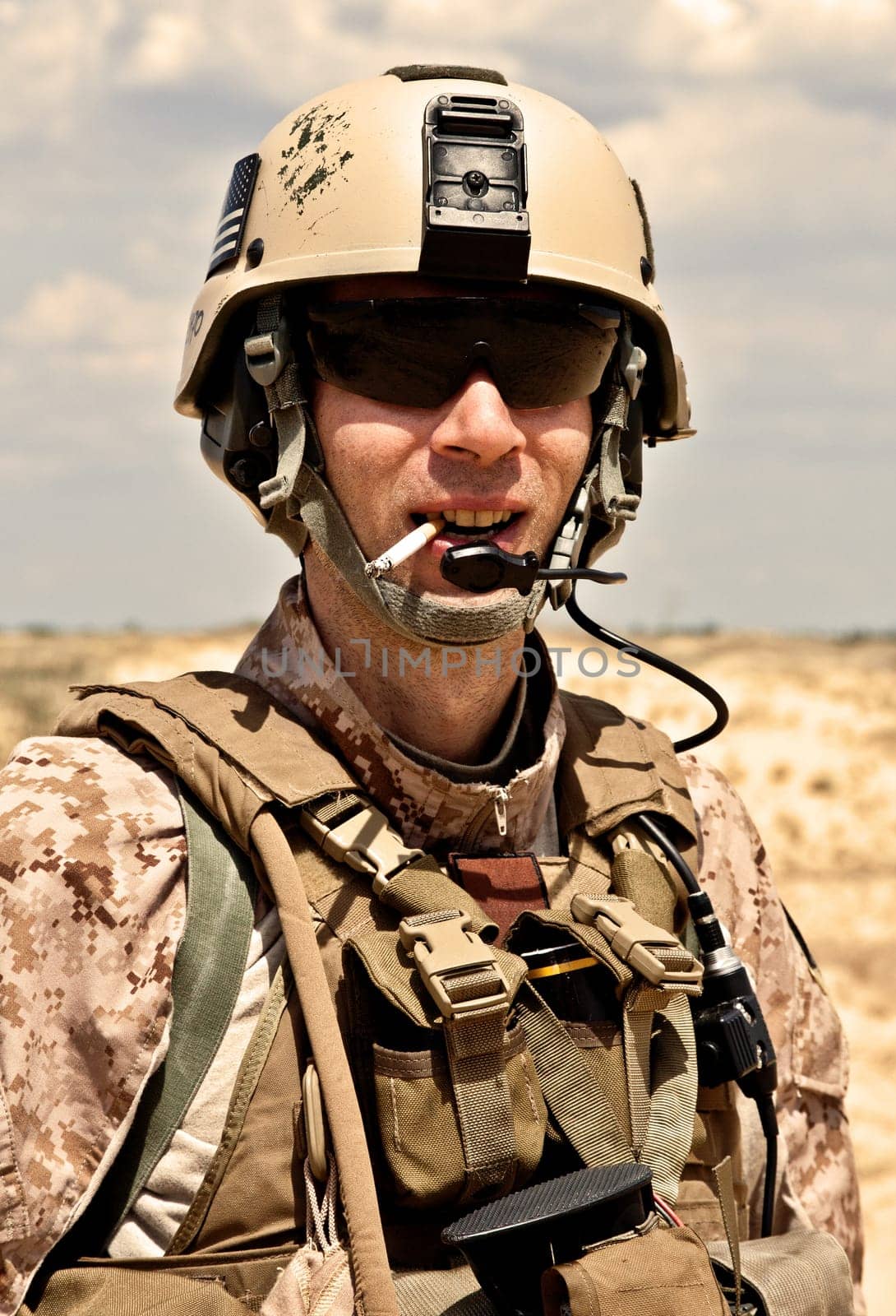 smiling US soldier smoking a cigarette
